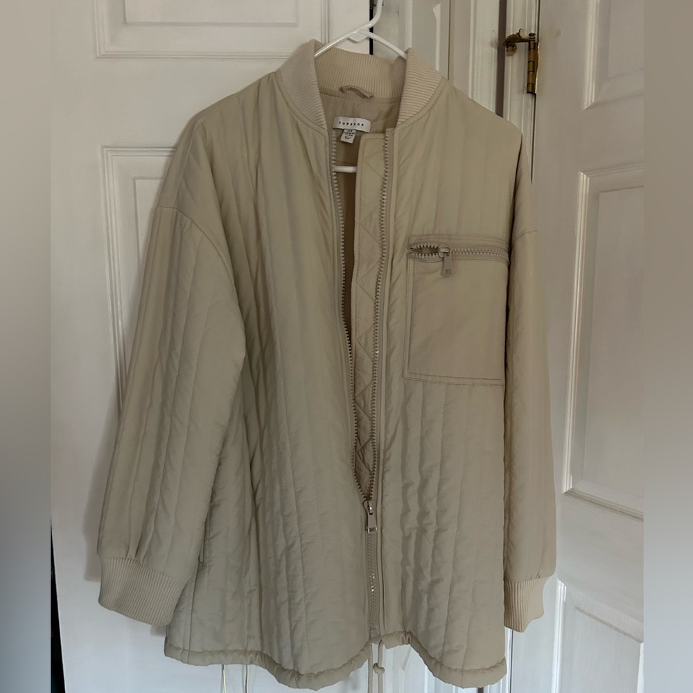 jacket from Nordstroms.   big for a size M.  Excellent condition